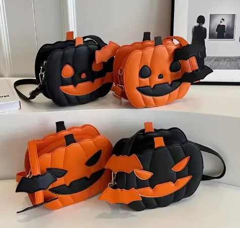 Orange and black pumpkin purses with bats